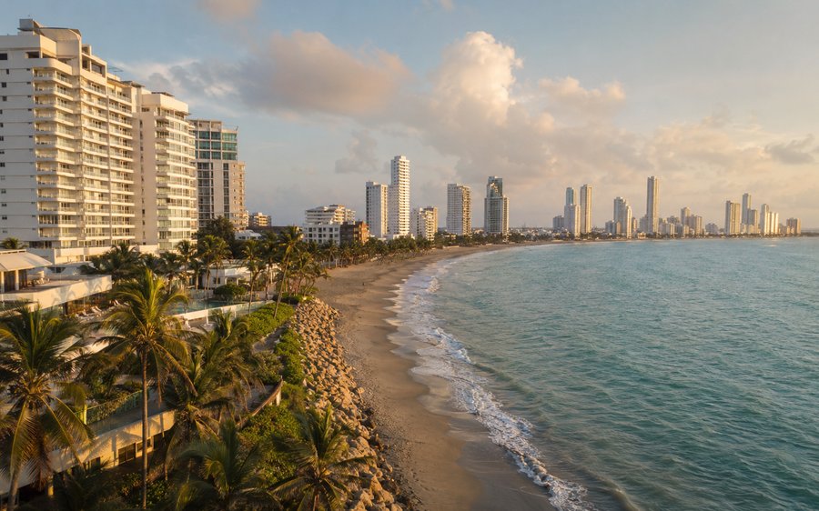 Bocagrande beachfront, Cartagena — modern high-rise hotels along the Caribbean coast at golden hour